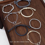 Set de 7 Pulseras Trenzadas Bohemias Vintage — Estilo Libre y Elegante para Toda Ocasión