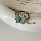 Conjunto de 2 Anillos Vintage con Mariposas y Flores — Estilo Elegante y Atemporal