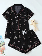 Conjunto Casual de Pijama con Estampado de Corazones Negros – Top sin Mangas y Pantalones Cortos para Mujer